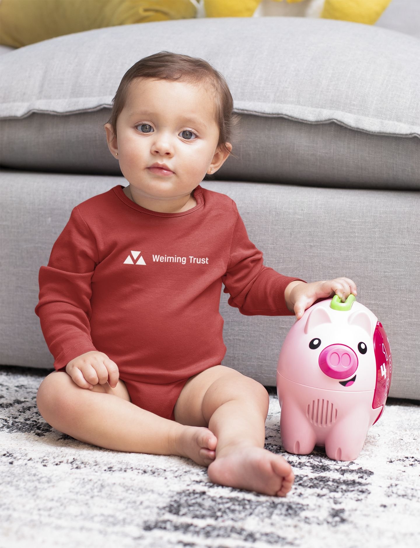 Woman registering for Autodeposit on her laptop while drinking a coffee